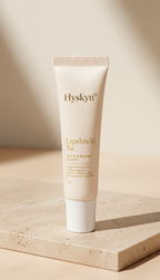 Hyskyn lip balm for dry lips tube on a beige background